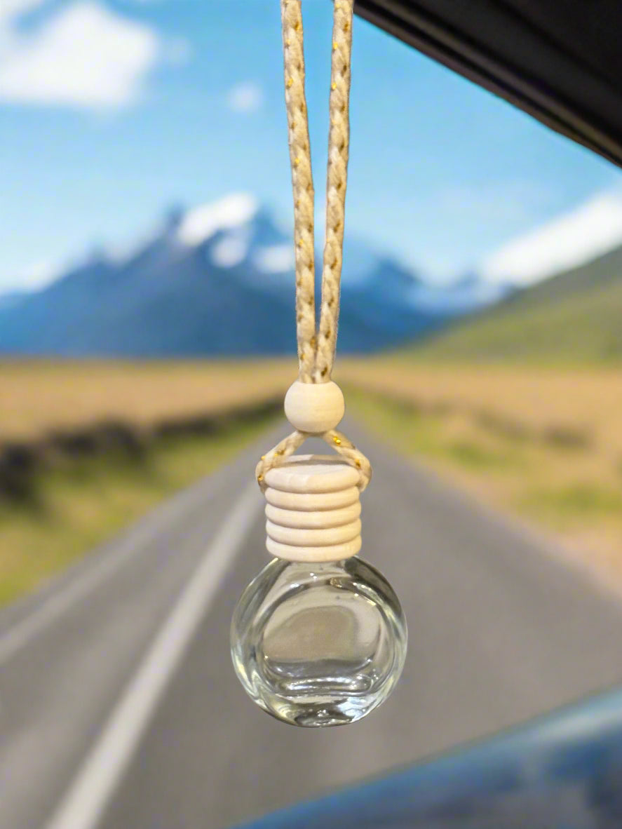Car Diffuser Bottle Hanging from Car Mirror